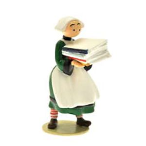 Figurine Bécassine et sa pile de livres