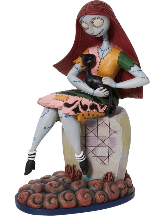 Figurine Sally sur une pierre tombale main product photo