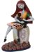 Figurine Sally sur une pierre tombale